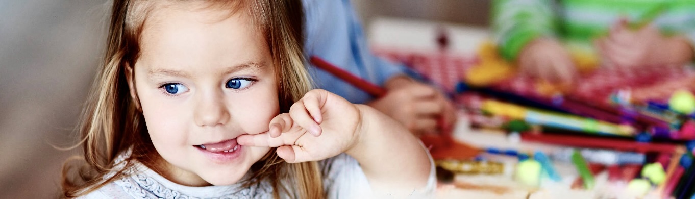 Child at art table at GloryBer's Spanish Academy